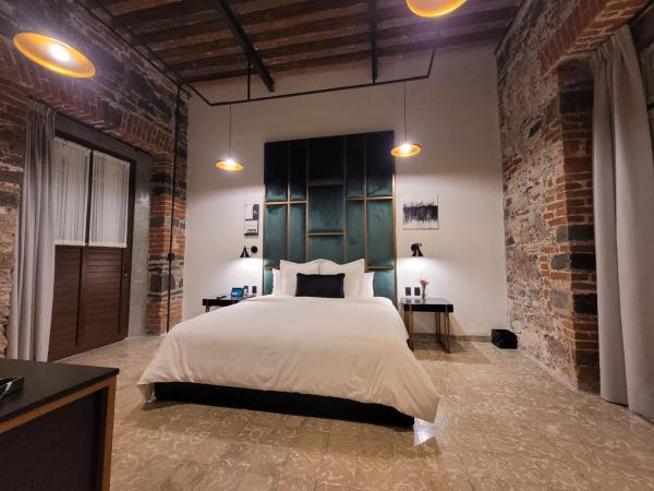 Milo Collection Hotel : photo 2 de la chambre suite lit queen-size