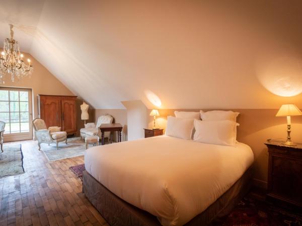 Domaine de Charnay - Résidence de charme : photo 5 de la chambre suite - vue sur jardin