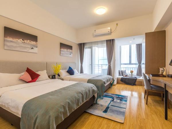 Livetour Hotel Shenzhou Road Metro Guangzhou : photo 1 de la chambre chambre lits jumeaux exécutive