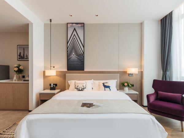 Livetour Hotel Shenzhou Road Metro Guangzhou : photo 2 de la chambre stylish king room