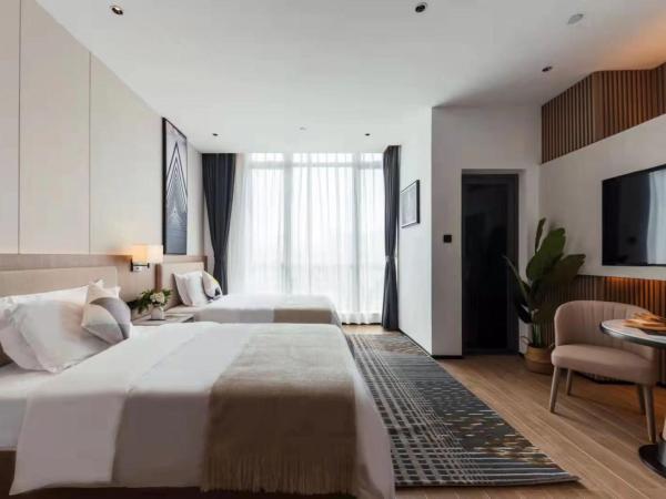 Livetour Hotel Shenzhou Road Metro Guangzhou : photo 1 de la chambre chambre lits jumeaux Élégante