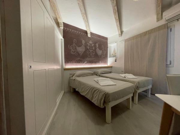 Domus de Diana : photo 2 de la chambre chambre double ou lits jumeaux