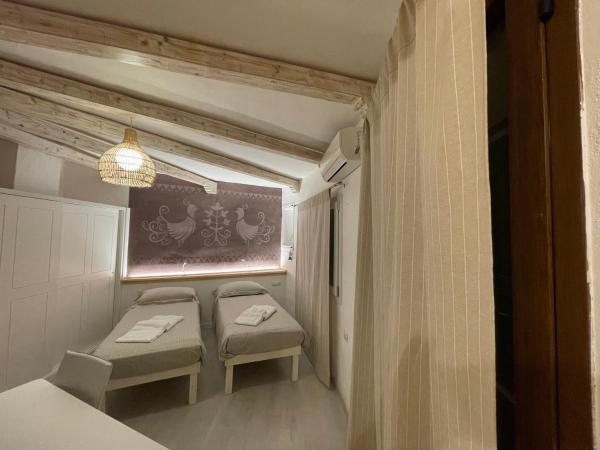 Domus de Diana : photo 4 de la chambre chambre double ou lits jumeaux