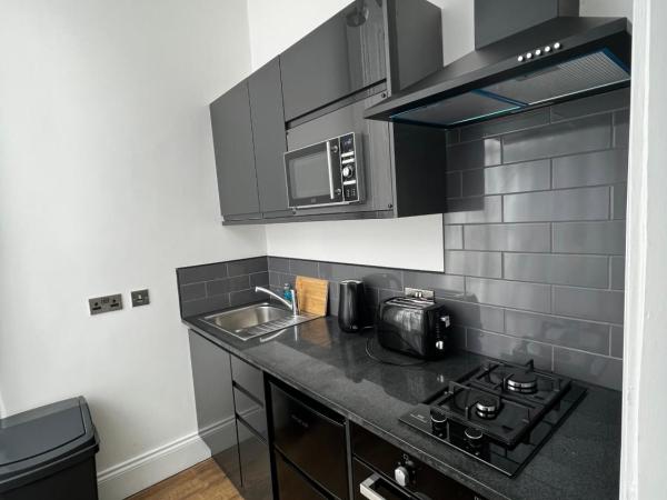 Amani Apartments - Glasgow City Centre : photo 7 de la chambre studio lit king-size