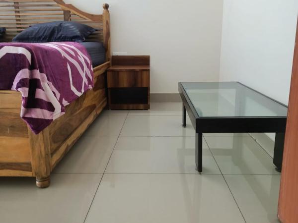 Royal Suites - 3 BHK - Neo : photo 4 de la chambre chambre lit queen-size deluxe