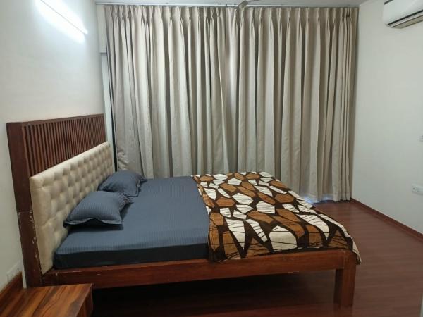 Royal Suites - 3 BHK - Neo : photo 9 de la chambre chambre lit king-size deluxe