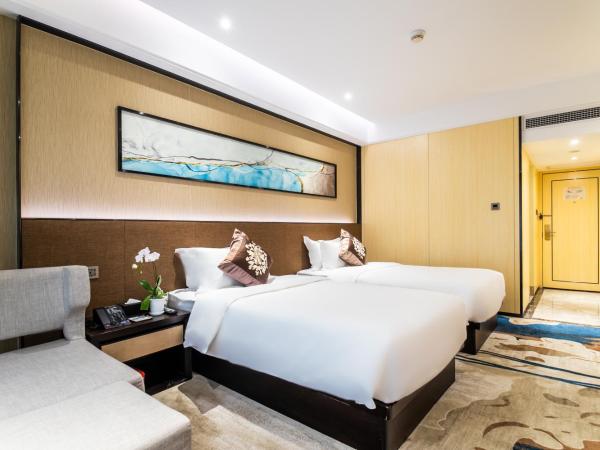 Landmark International Hotel : photo 5 de la chambre chambre lits jumeaux deluxe