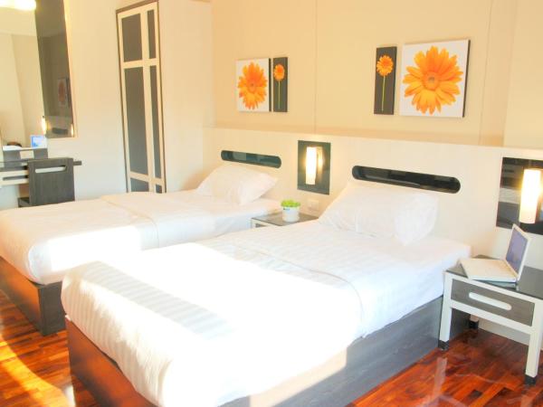 The Inn Saladaeng : photo 5 de la chambre chambre deluxe double ou lits jumeaux