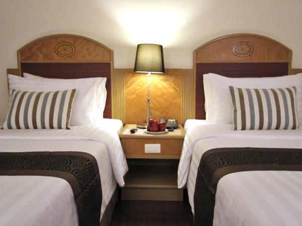 Grand Tower Inn Rama 6 - SHA Extra Plus : photo 5 de la chambre chambre triple