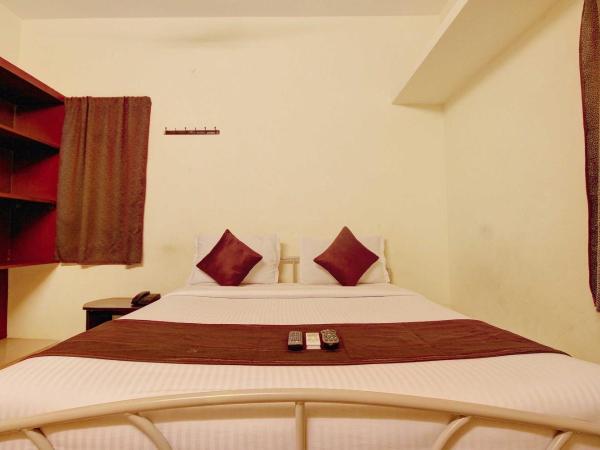 Flagship Yazhini Service Apartment Near Jazz Cinemas Luxe : photo 10 de la chambre chambre double standard