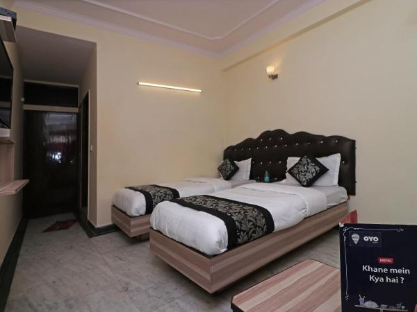 OYO Hotel Silver Shine Near Gurudwara Shri Bangla Sahib : photo 5 de la chambre chambre triple classique