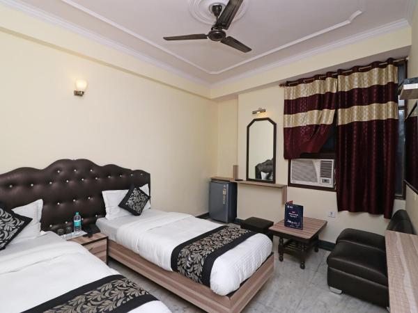OYO Hotel Silver Shine Near Gurudwara Shri Bangla Sahib : photo 3 de la chambre chambre triple classique