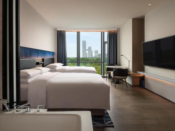 Guangzhou Marriott Hotel Nansha : photo 2 de la chambre ecological double room with two double beds and city view
