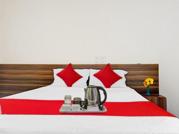 SPOT ON Swarg Executive Paradise Near Fun Time Multiplex : photo 2 de la chambre chambre triple classique