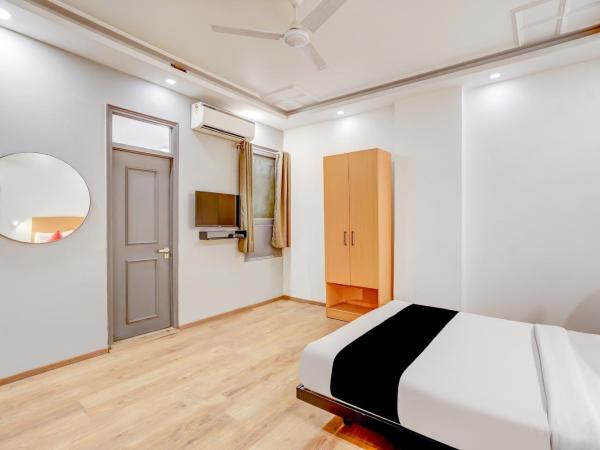 Super Capital O Hotel Jp Tower : photo 1 de la chambre chambre triple deluxe