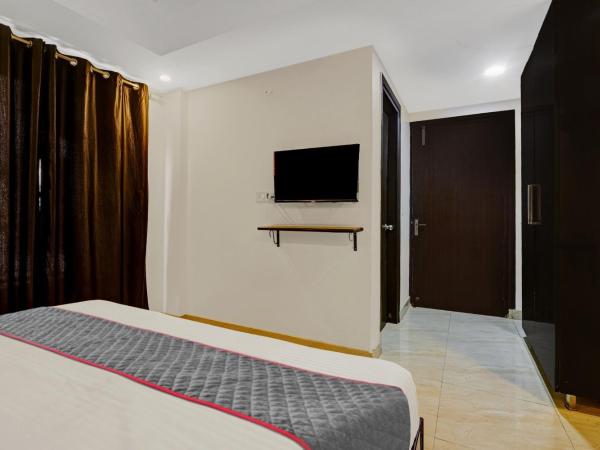 Townhouse Tipsyy Near Bestech Central Square Mall : photo 7 de la chambre chambre triple classique