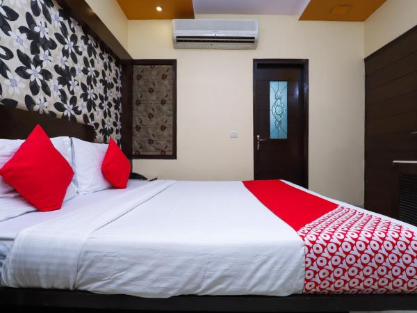 Super OYO Hotel J P Inn Near Patel Nagar Metro Station : photo 4 de la chambre chambre triple classique