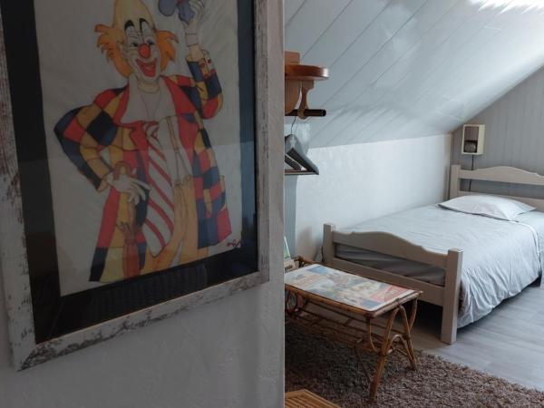 Chambres d'Hôtes de l'Ile du Saule : photo 9 de la chambre chambre familiale - vue sur jardin