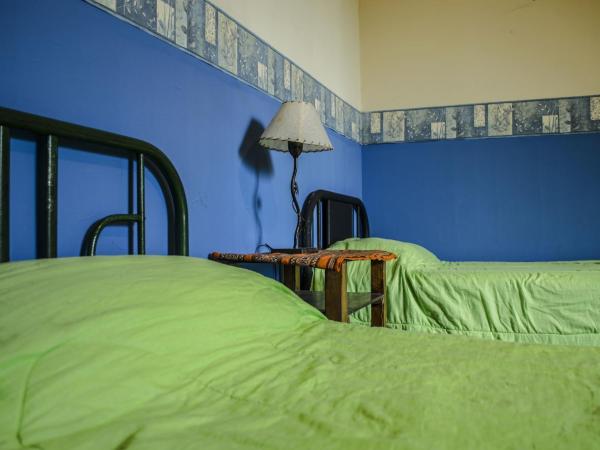 La Covacha Youth Hostel : photo 4 de la chambre lit dans dortoir mixte de 4 lits
