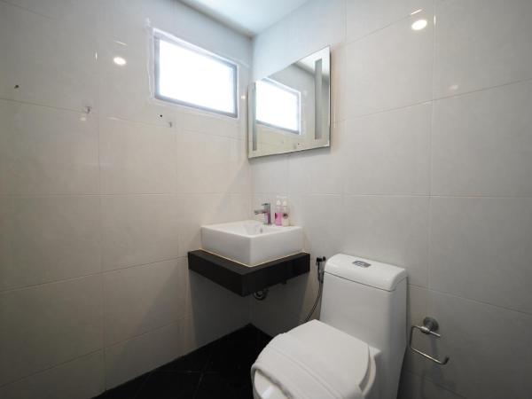 RoomQuest Bangkok Don Mueang Airport : photo 8 de la chambre chambre lits jumeaux standard