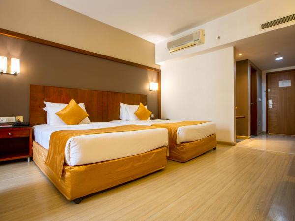 Evoma : photo 3 de la chambre chambre deluxe double ou lits jumeaux