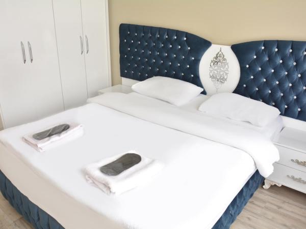 palmiye suıt otel : photo 5 de la chambre appartement