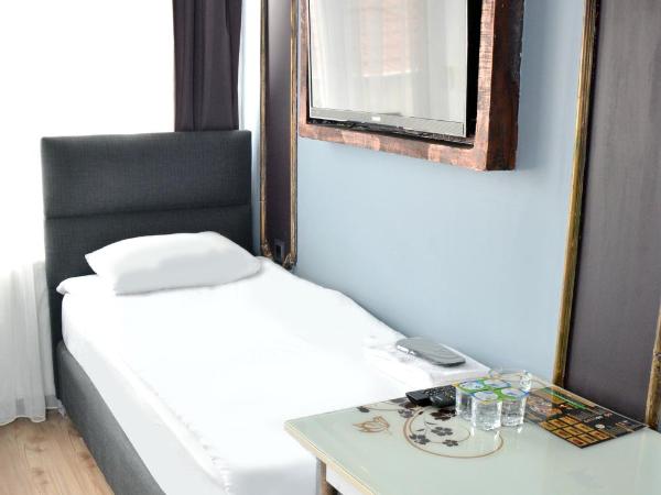 palmiye suıt otel : photo 3 de la chambre appartement