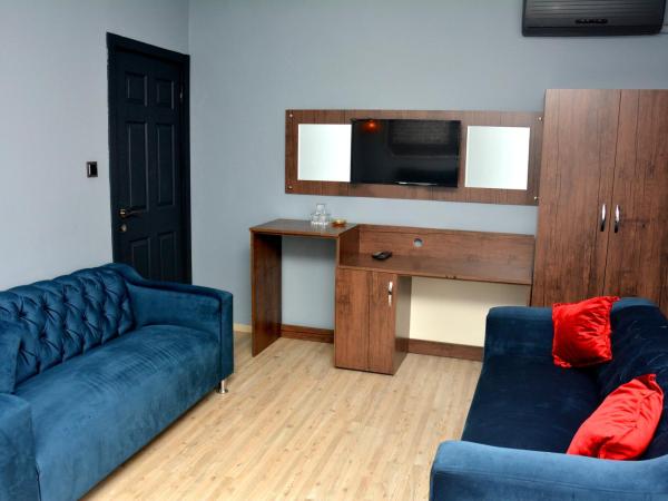 palmiye suıt otel : photo 3 de la chambre appartement