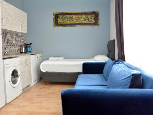 palmiye suıt otel : photo 7 de la chambre appartement