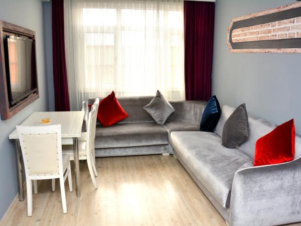 palmiye suıt otel : photo 5 de la chambre appartement