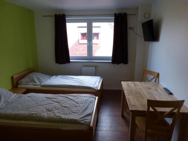 Hansehus : photo 2 de la chambre chambre triple avec salle de bains