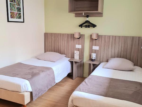 Hôtel Caravelle Contact Hôtel : photo 2 de la chambre chambre quadruple