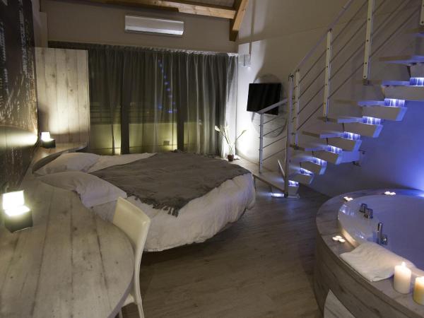 Hotel Seven Rooms : photo 1 de la chambre chambre quadruple supérieure en duplex