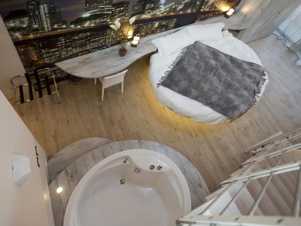 Hotel Seven Rooms : photo 5 de la chambre chambre quadruple supérieure en duplex