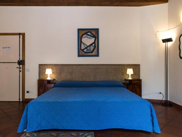 Piazza Paradiso Accommodation : photo 7 de la chambre studio - bâtiment séparé