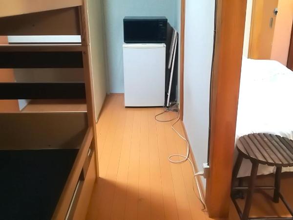 Guesthouse Oasis : photo 4 de la chambre chambre triple Économique avec salle de bains commune