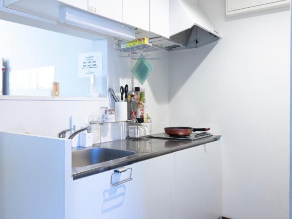 Cafe & Guest House Nagonoya : photo 10 de la chambre chambre de style japonais avec salle de bains commune - non-fumeurs