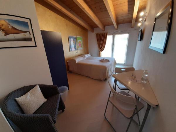Il Girasole High Quality Inn : photo 7 de la chambre chambre deluxe double ou lits jumeaux