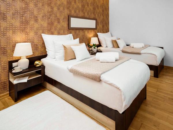 Hotel Dikul Market Square Wroclaw : photo 1 de la chambre chambre lits jumeaux