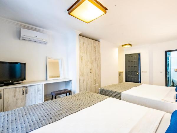 Costa Bodrum City : photo 4 de la chambre chambre quadruple