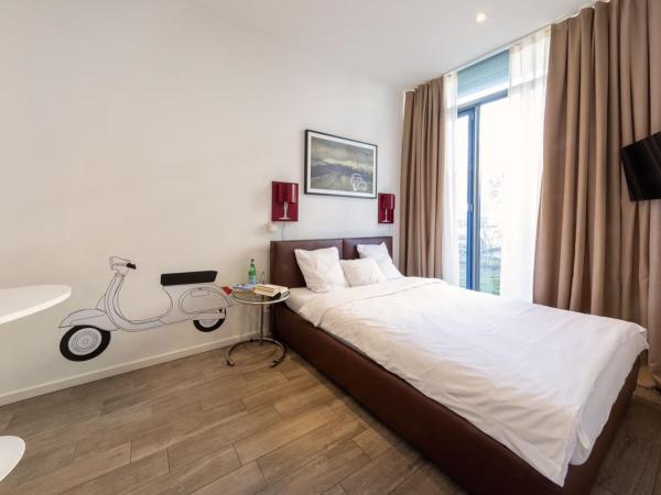 Brera Serviced Apartments Munich West : photo 2 de la chambre appartement cosy avec cuisine