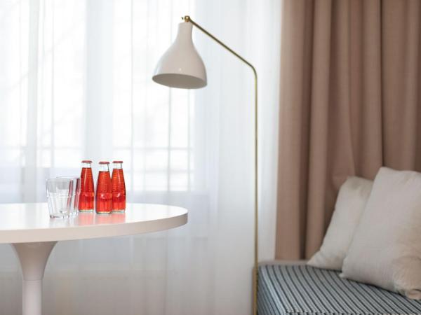 Brera Serviced Apartments Munich West : photo 6 de la chambre appartement confortable avec cuisine