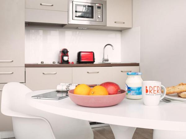 Brera Serviced Apartments Munich West : photo 7 de la chambre appartement incroyable avec cuisine