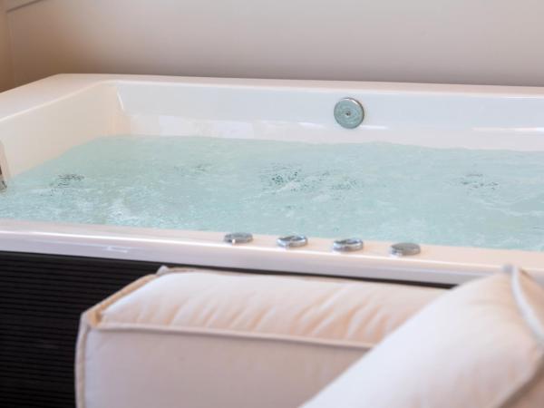 The Secret Boutique Hotel : photo 6 de la chambre suite avec jacuzzi