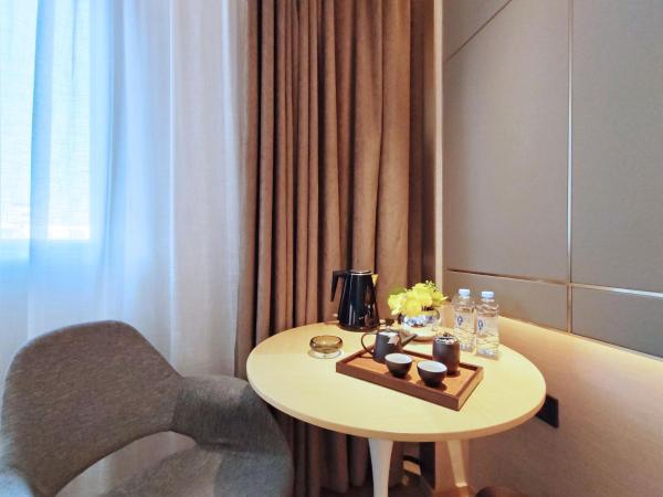 Paco Hotel Guangzhou South Railway Station Panyu Changlong Branch : photo 1 de la chambre chambre familiale deluxe