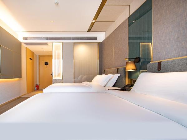 Paco Hotel Guangzhou South Railway Station Panyu Changlong Branch : photo 7 de la chambre chambre lits jumeaux supérieure