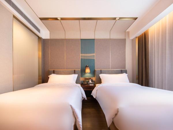 Paco Hotel Guangzhou South Railway Station Panyu Changlong Branch : photo 9 de la chambre chambre lits jumeaux supérieure