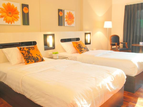 The Inn Saladaeng : photo 4 de la chambre chambre deluxe double ou lits jumeaux