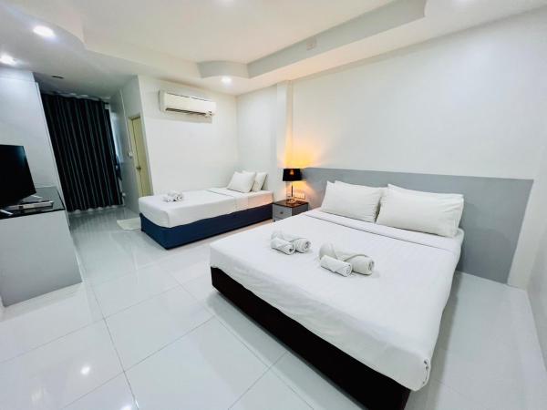 Bed by Tha-Pra SHA Plus : photo 2 de la chambre chambre double deluxe avec lit d'appoint