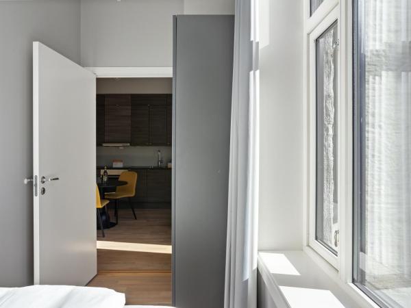 numa l Topp Apartments : photo 9 de la chambre large studio with kitchen - single bed, accessible